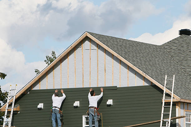 Professional Siding Contractor technician working in Huntington Station, NY